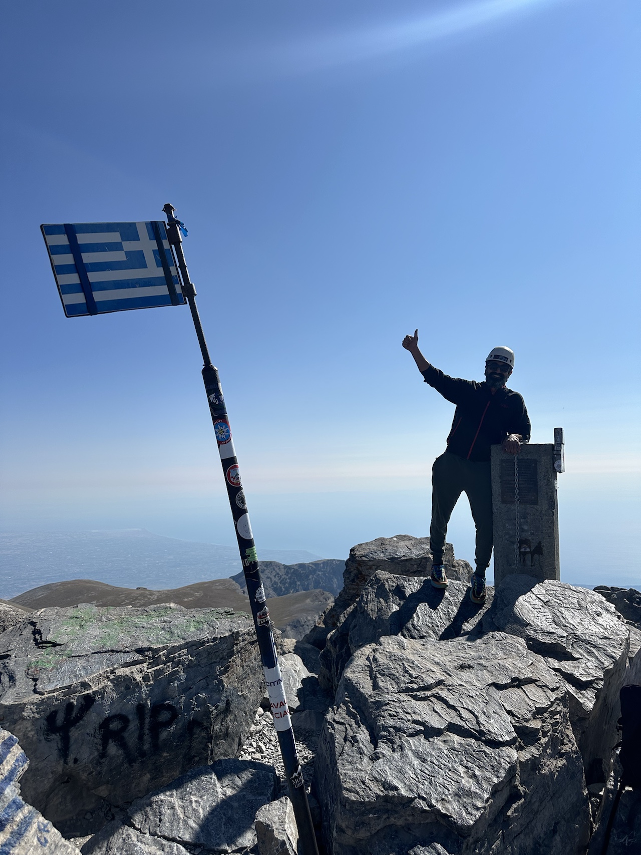 Standing atop Mytikas, the highest peak of Mount Olympus at 2,917 meters. From here, I feel connected to both my journey abroad and my return home.